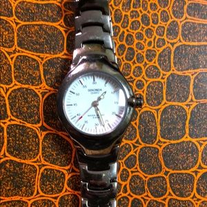 Sekonda women’s small face heavy titanium watch